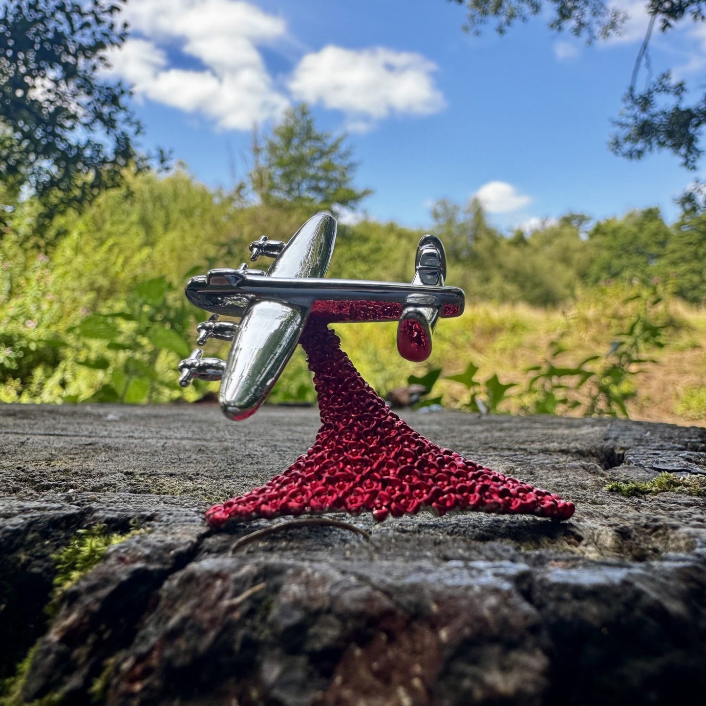 Lancaster-Bomber-Poppy-Brooch-On-Wood